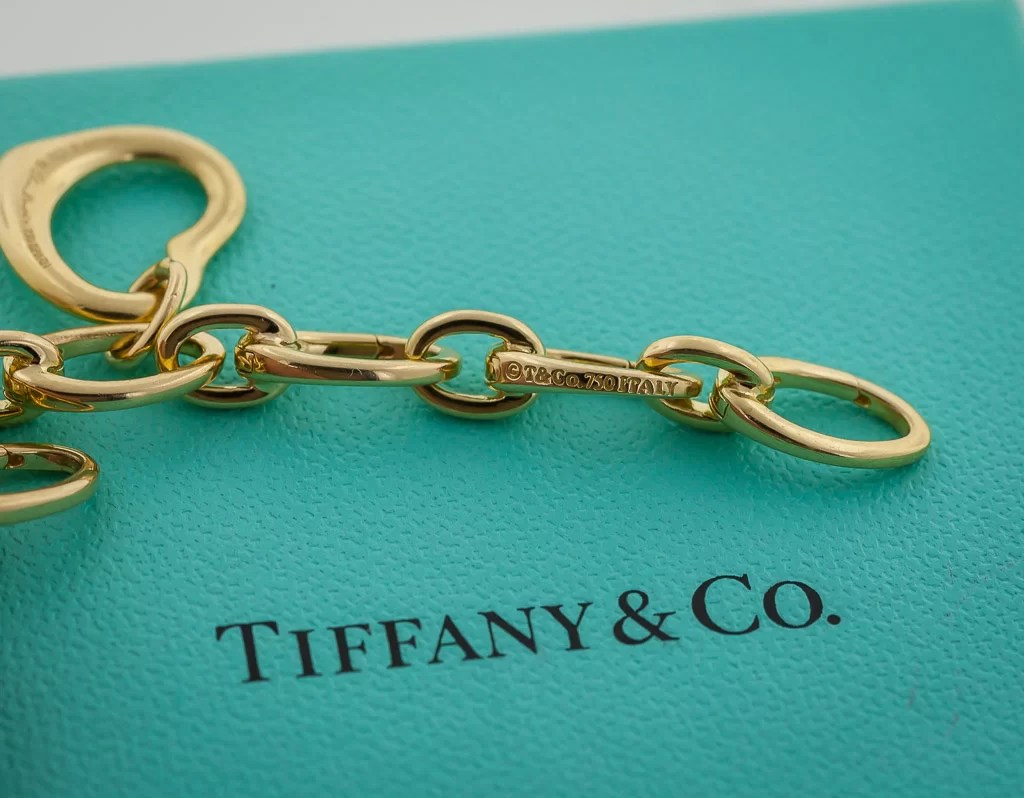 Tiffany & Co Charm Bracelet, 18K Yellow Gold, Cable Car, Eiffel Tower
