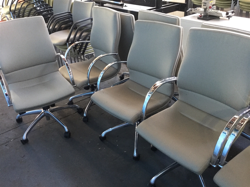 Quantity of 7 Matching Pedestal Gas Lift Chairs with Chromed Arms