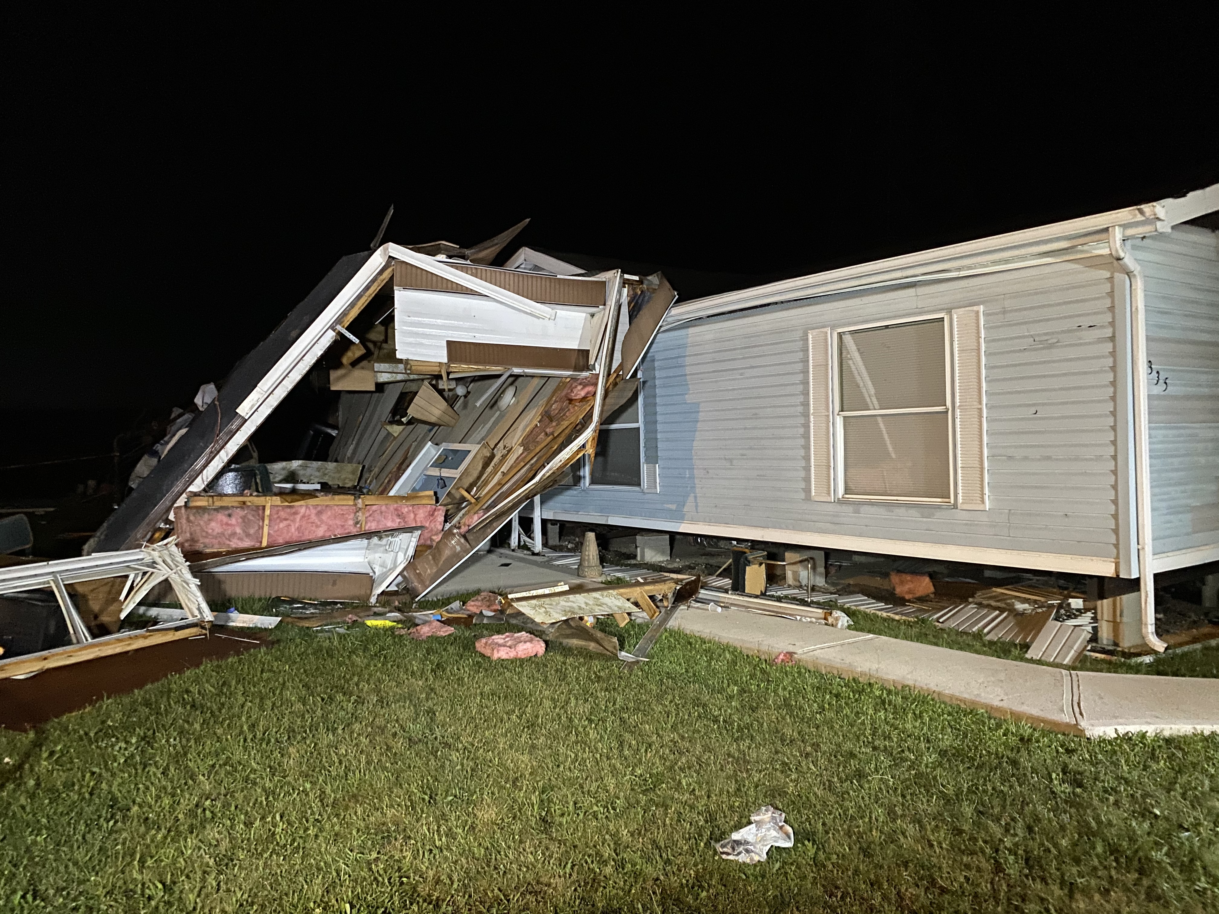 Indiana woman who died in mobile home during storm was found clutching