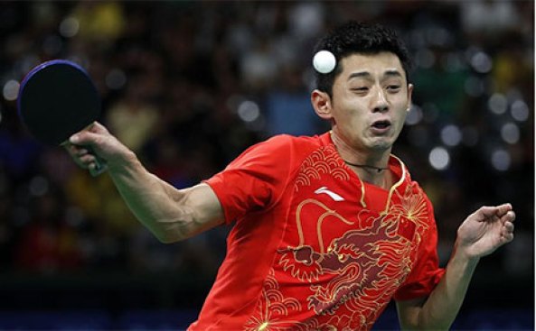 Zhang Jike smashing a lob