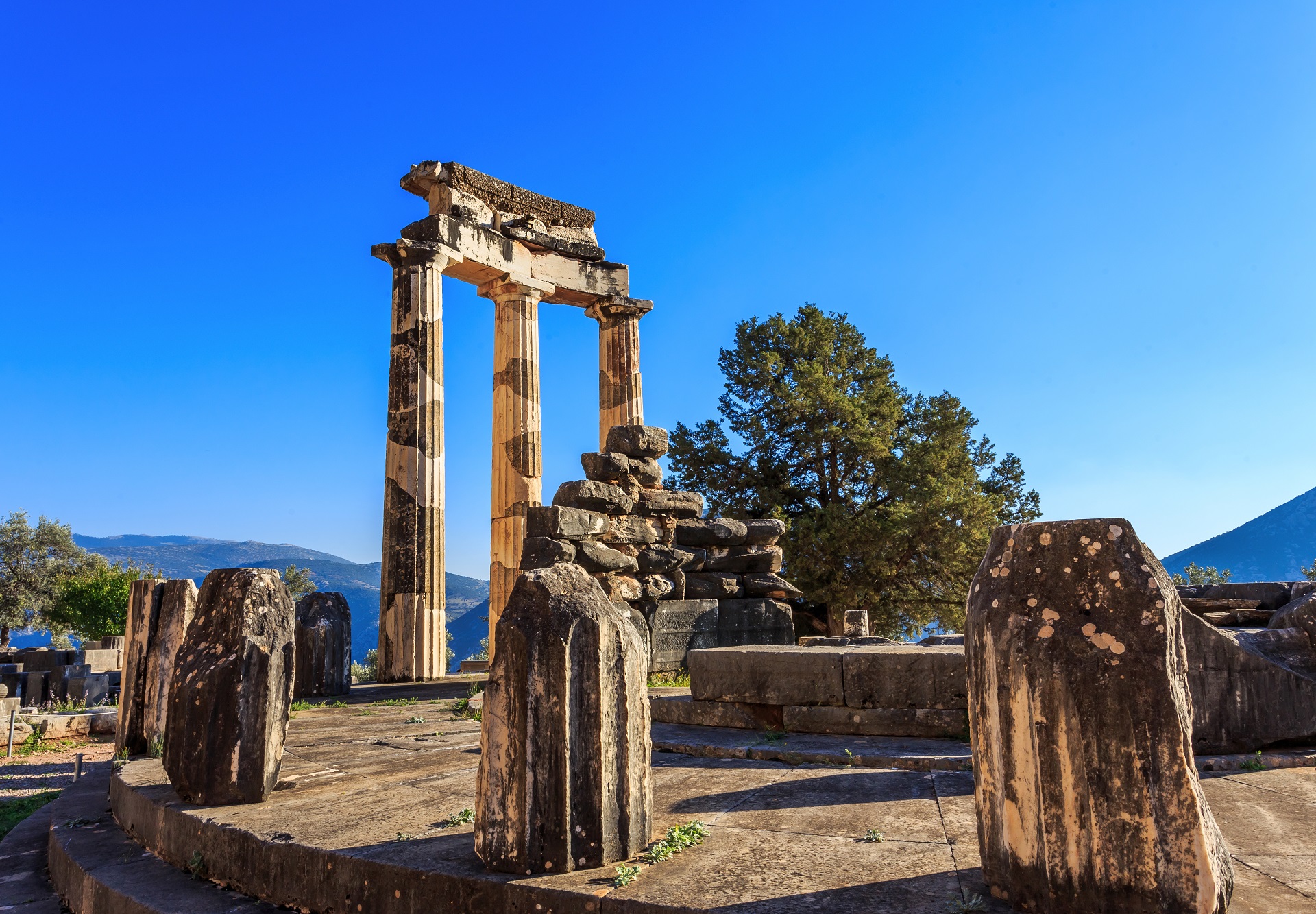 to Delphi, antiquity’s center of the Earth! Explore Greece