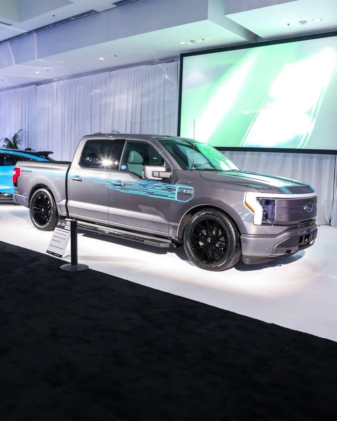Modified 2022 F150 Lightning lowered on 22" wheels & 305/45