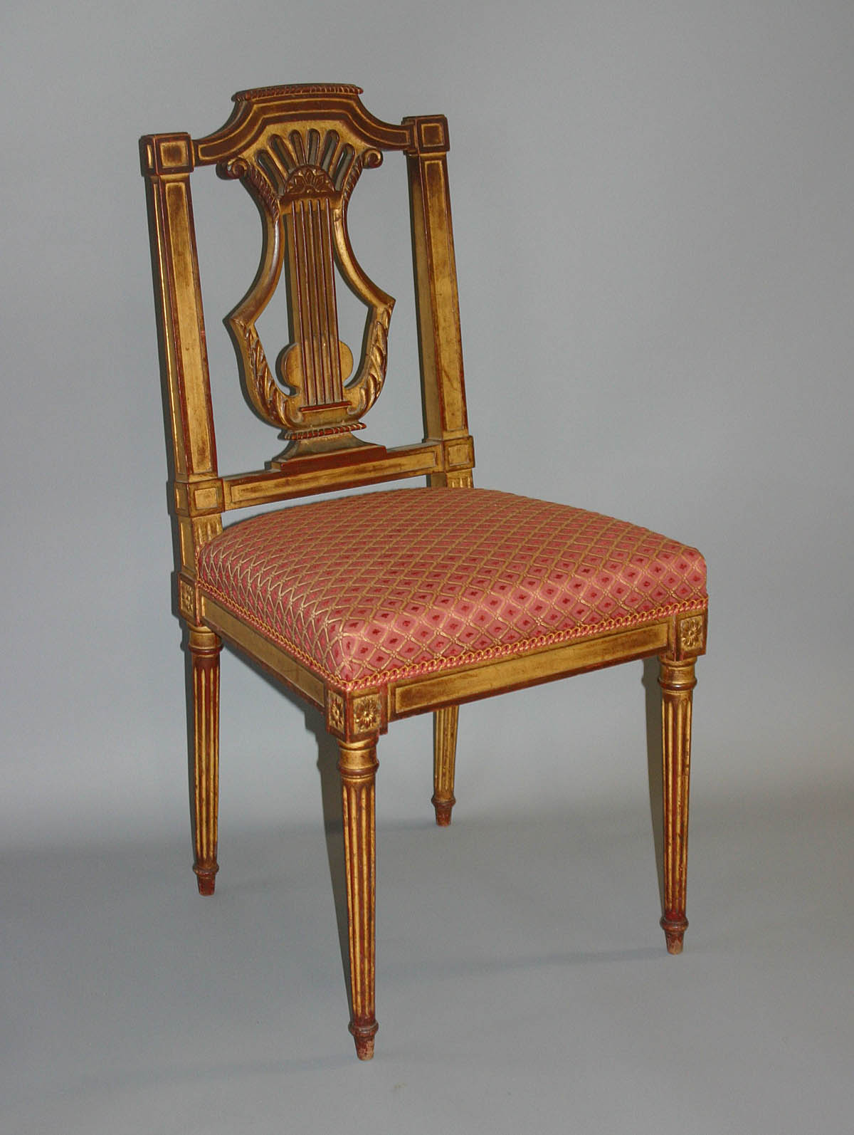 Set of ten French, Louis XVI style, giltwood, lyreback dining chairs