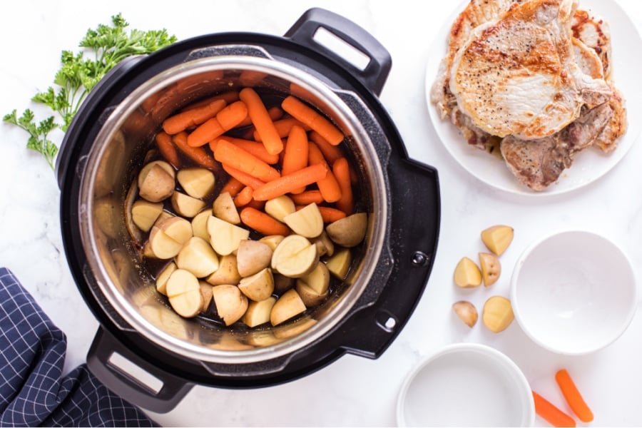 To make instant pot pork chops, start by seasoning about 4 or 5 pork chops (about a pound to a pound and a half). Instant Pot Pork Chops With Carrots And Potatoes Family Fresh Meals