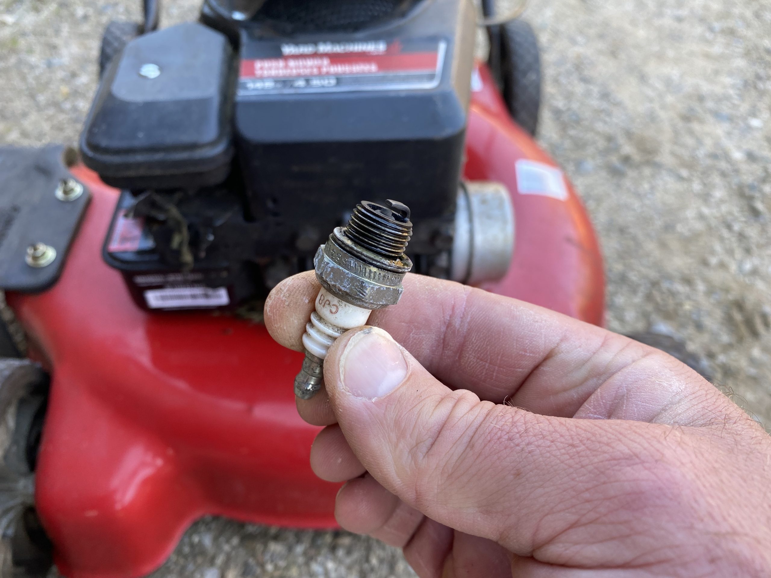 How To Remove a Spark Plug From a Lawn Mower