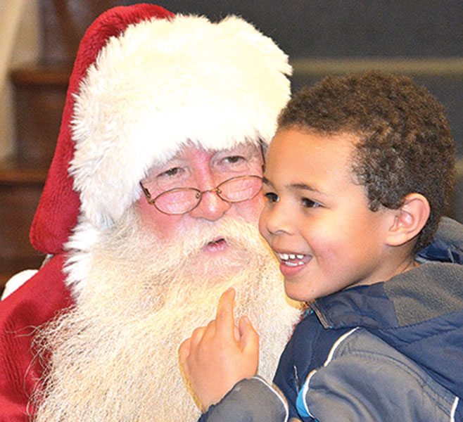 Hudson man spreads holiday cheer as Santa for three decades