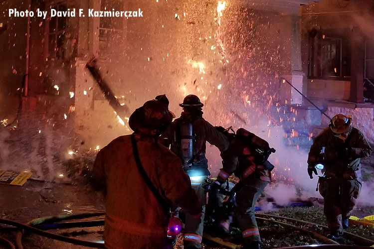 Near Miss for Buffalo (NY) Firefighters Responding to House Fire Fire