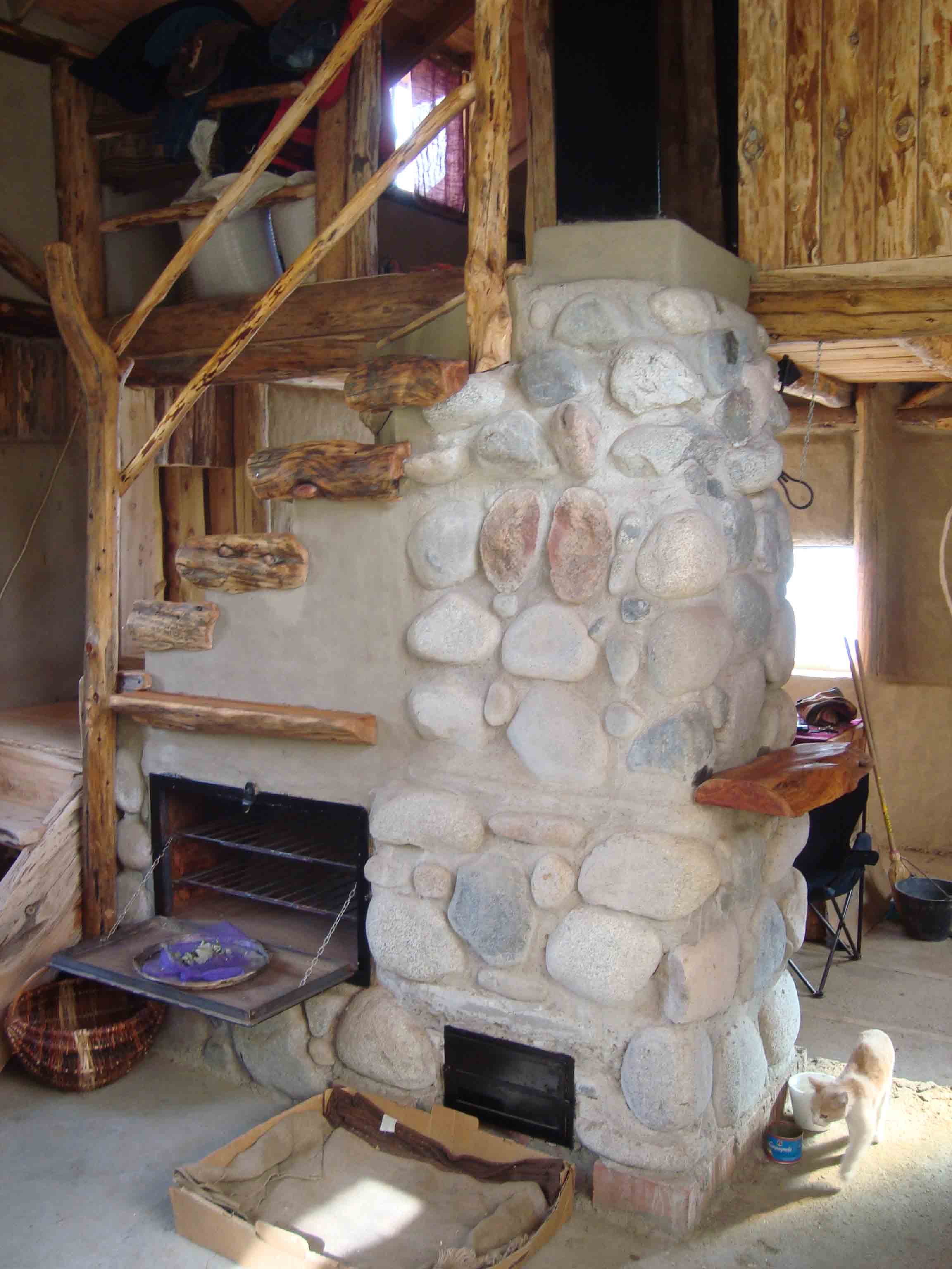 Fireplace, Mass Stove, Oven, Water Heater, and Staircase all in One