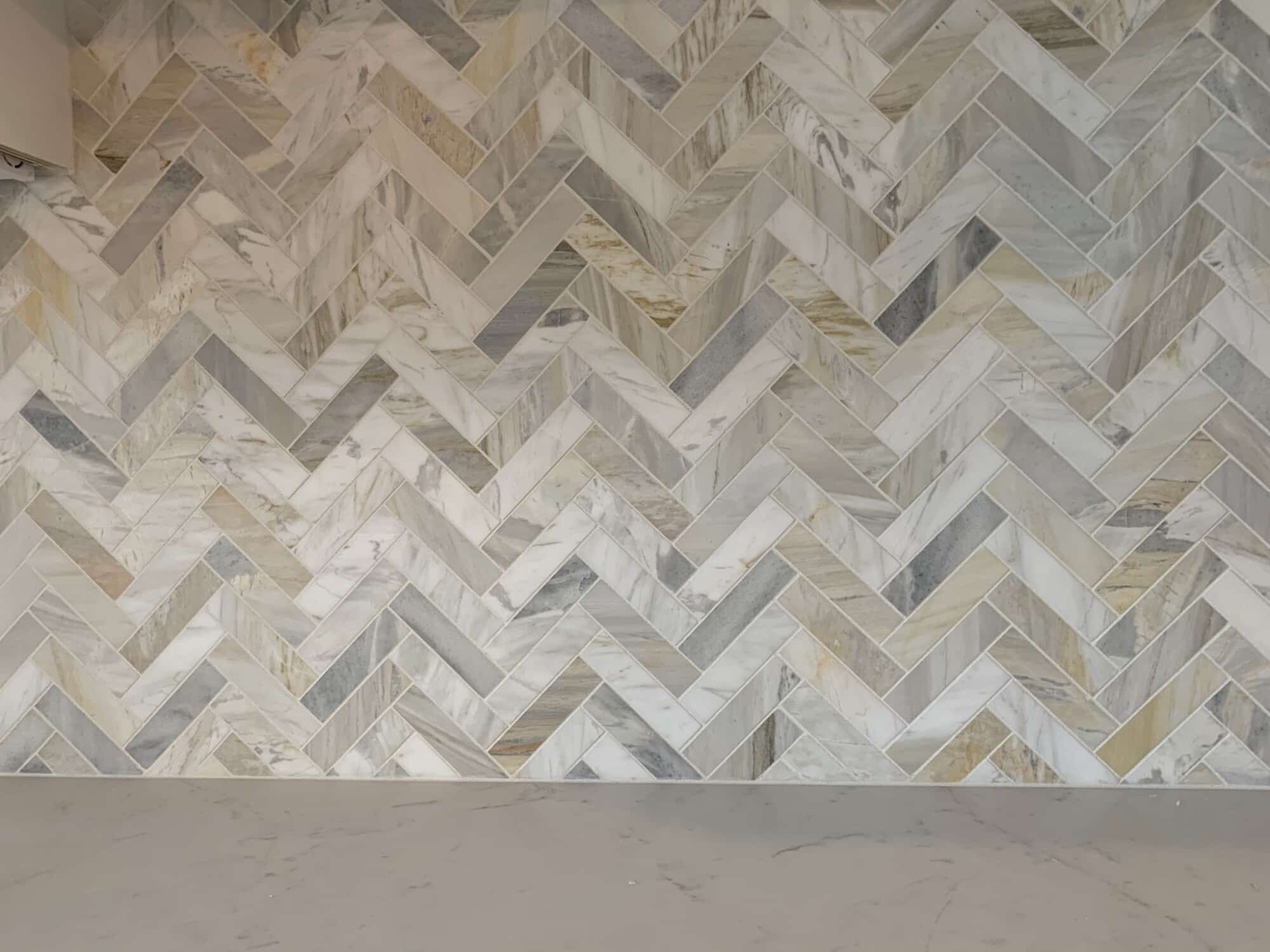 FLOOR360 Herringbone Stone Tile installation