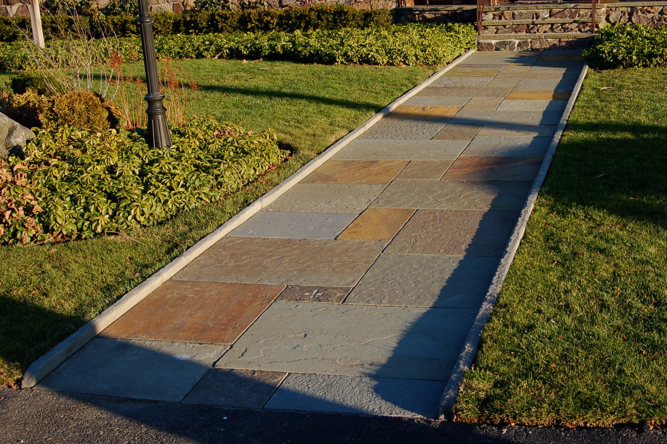 Stone masonry in Swampscott, MA Bluestone walkway and edge