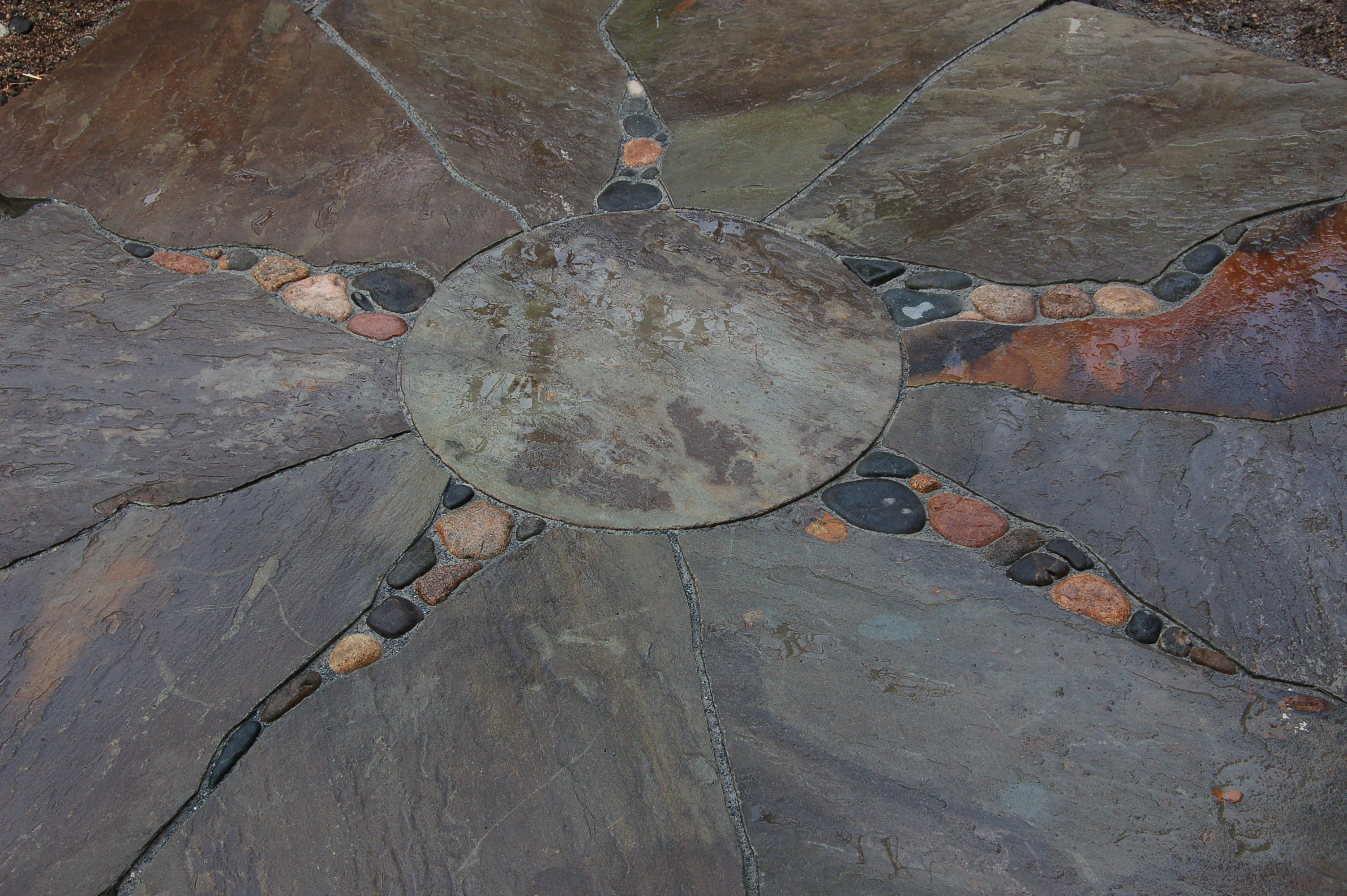 Stone masonry in Newton, MA. Bluestone patio design detail