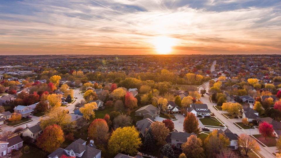 Will The Housing Market Cool Off By Fall? Here’s What Experts Predict