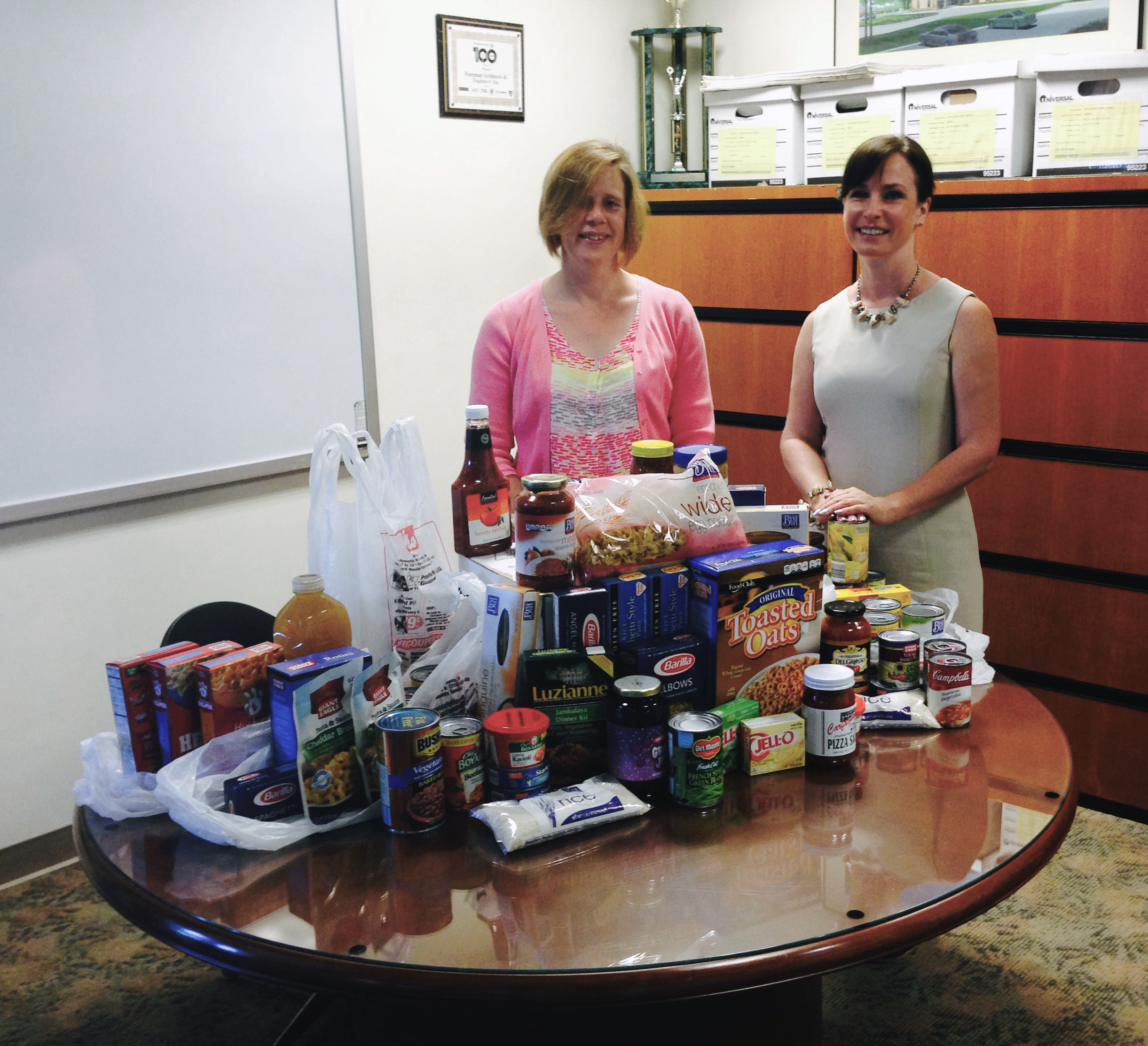 Foreman Group Makes Food Pantry Donation