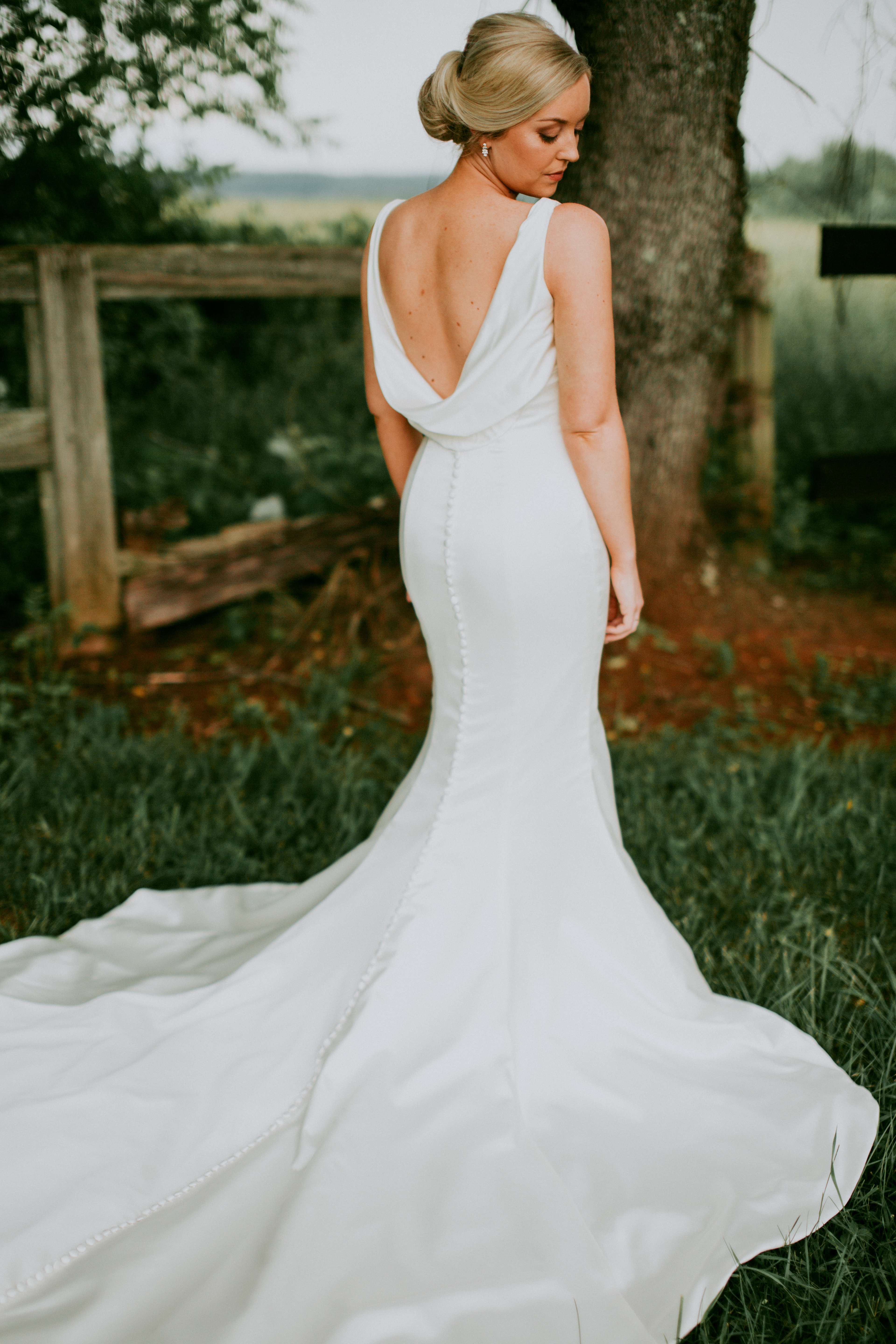 Bride outdoors in wedding dress