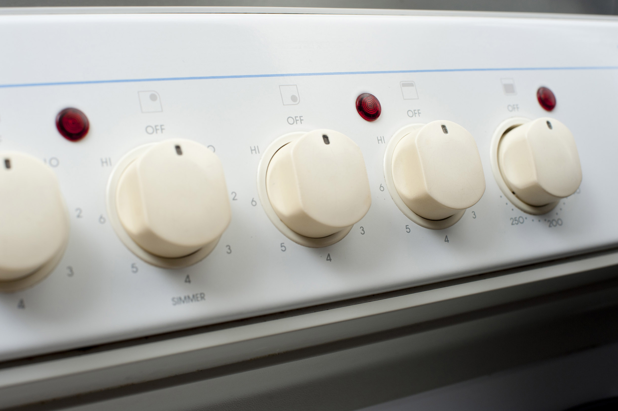 Free Stock Photo 8411 Row of control knobs on a stove freeimageslive