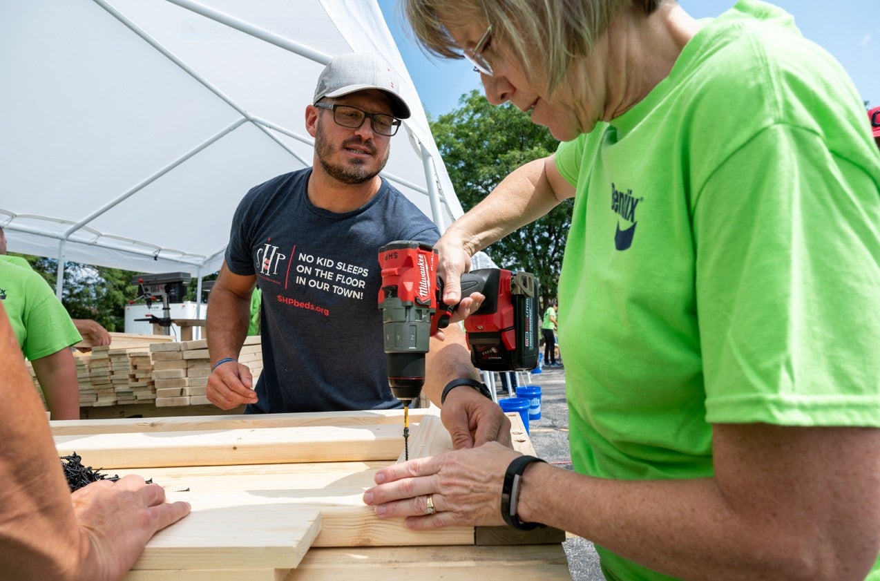 The Log Book Bendix employees build beds for children in need
