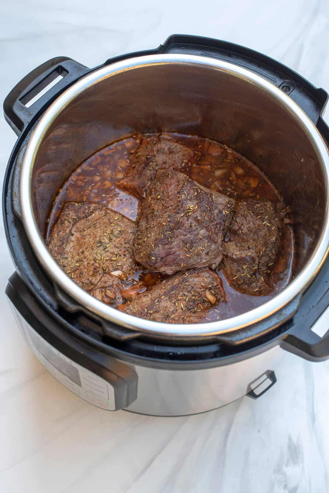 Such a simple pot roast that yields a scrumptious in fact, my beloved slow cooker may be collecting a little dust lately as i tend to reach for my instant pot more often these days! Instant Pot Pot Roast With Carrots And Potatoes Valerie S Kitchen