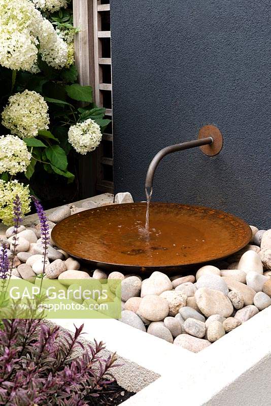 Water feature with c... stock photo by Caroline Mardon, Image 1361607