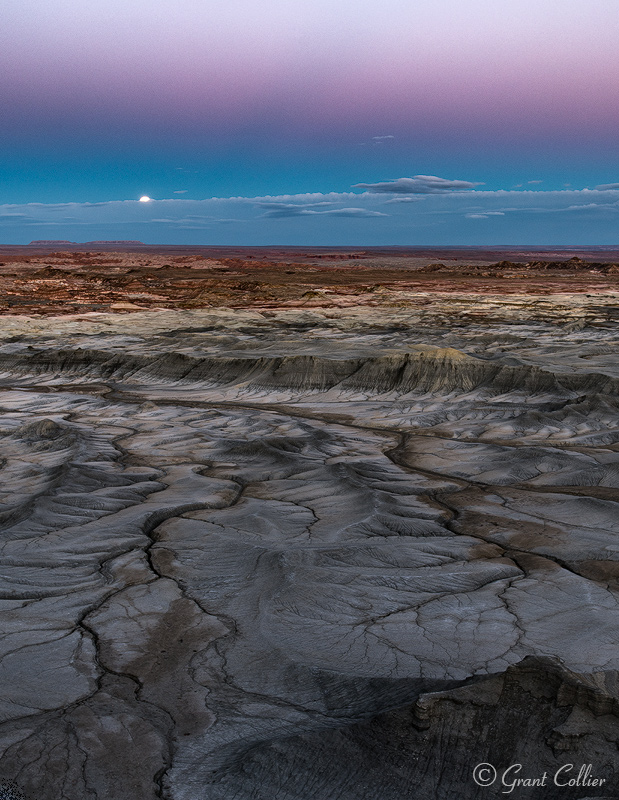 Full Moon Rising Over Badlands of Utah During Twilight