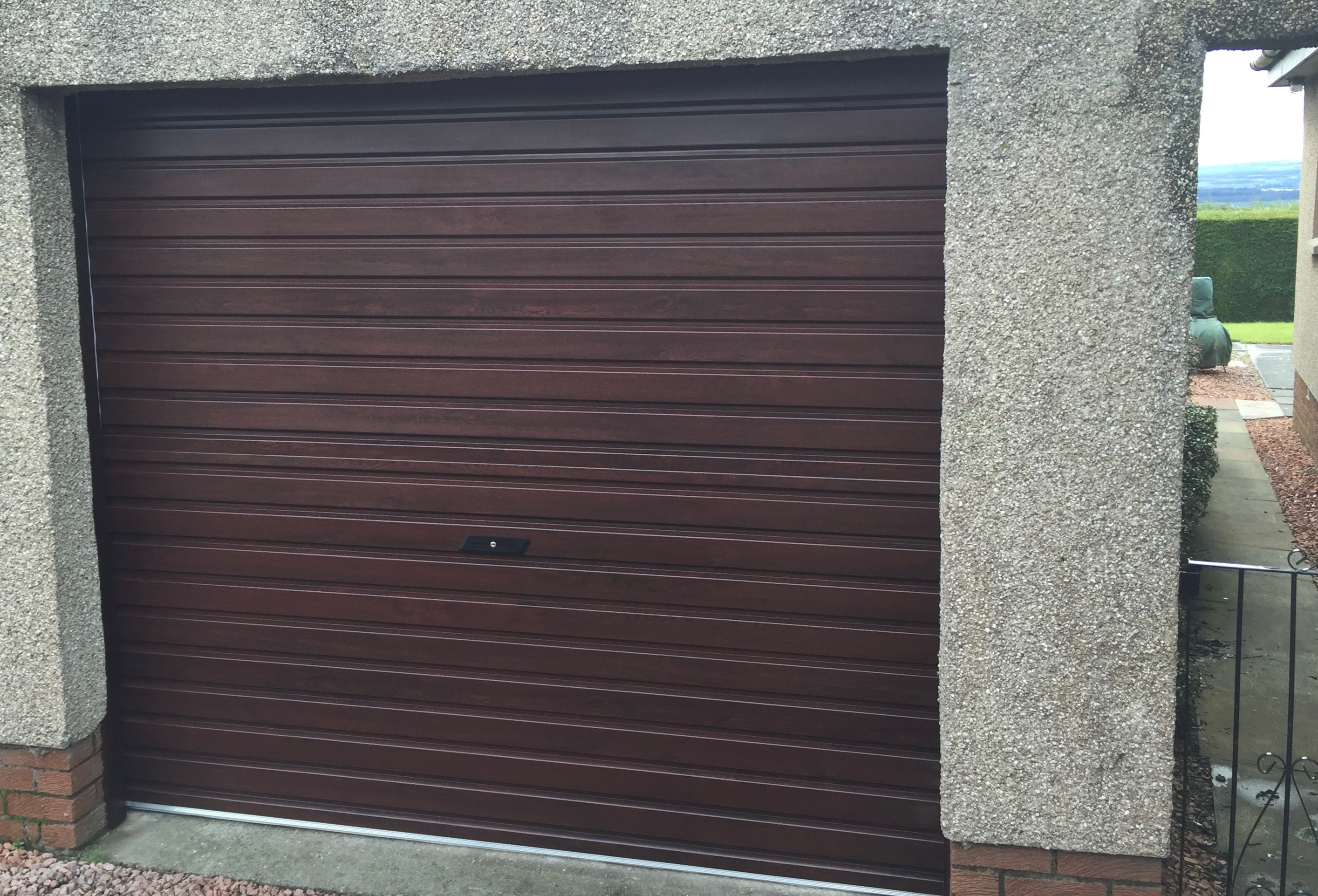 Roller Door Noninsulated in Rosewood Manual garage Roller Door Noninsulated in Rosewood Manual garage
