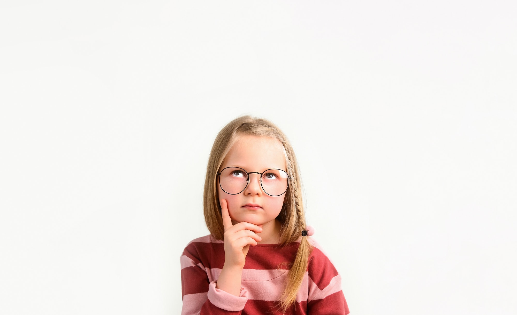 Little girl child thinking. Ponder and make a decision. Pensive and puzzled.