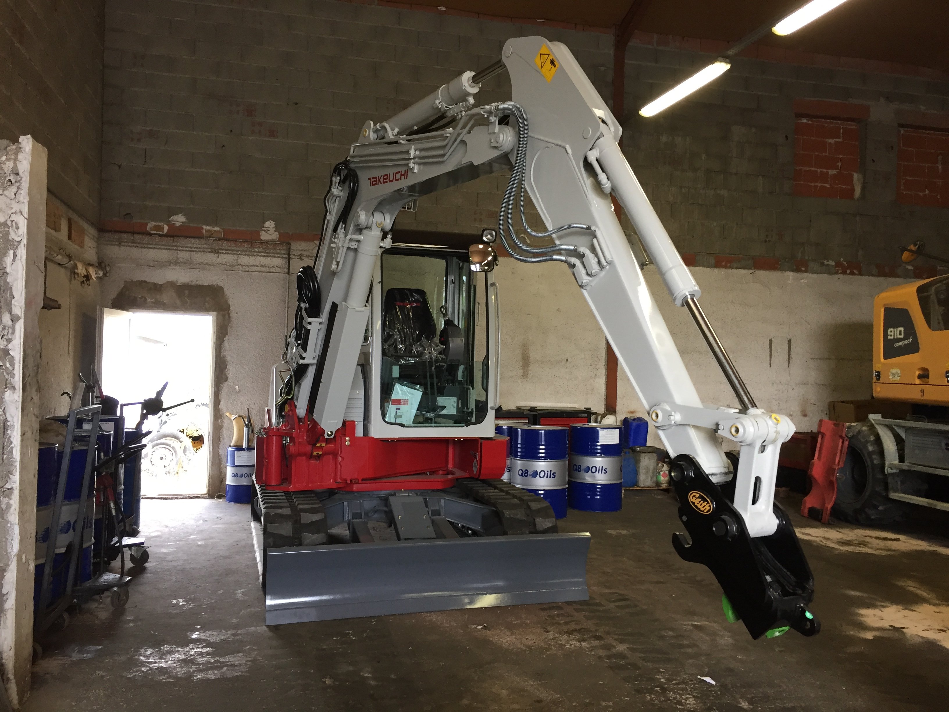 Attache rapide inclinable en action Geith Excavator Attachments