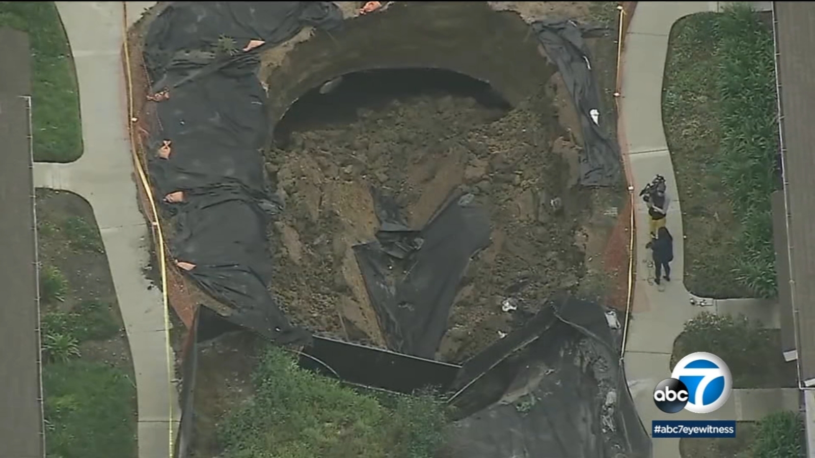Second sinkhole opens behind condo complex in La Habra, California