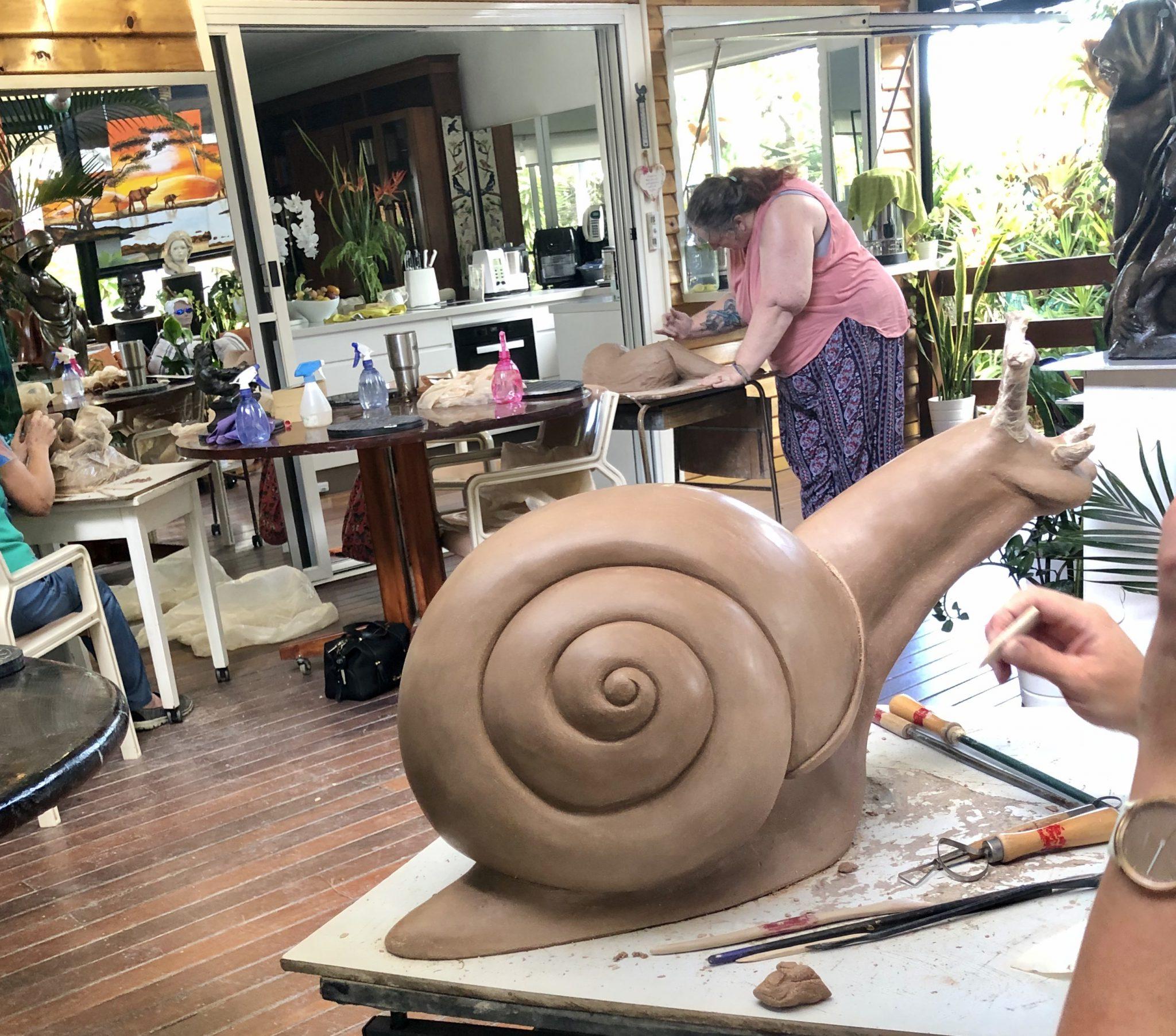 Clay art class where Amy carved out her snail sculpture Art