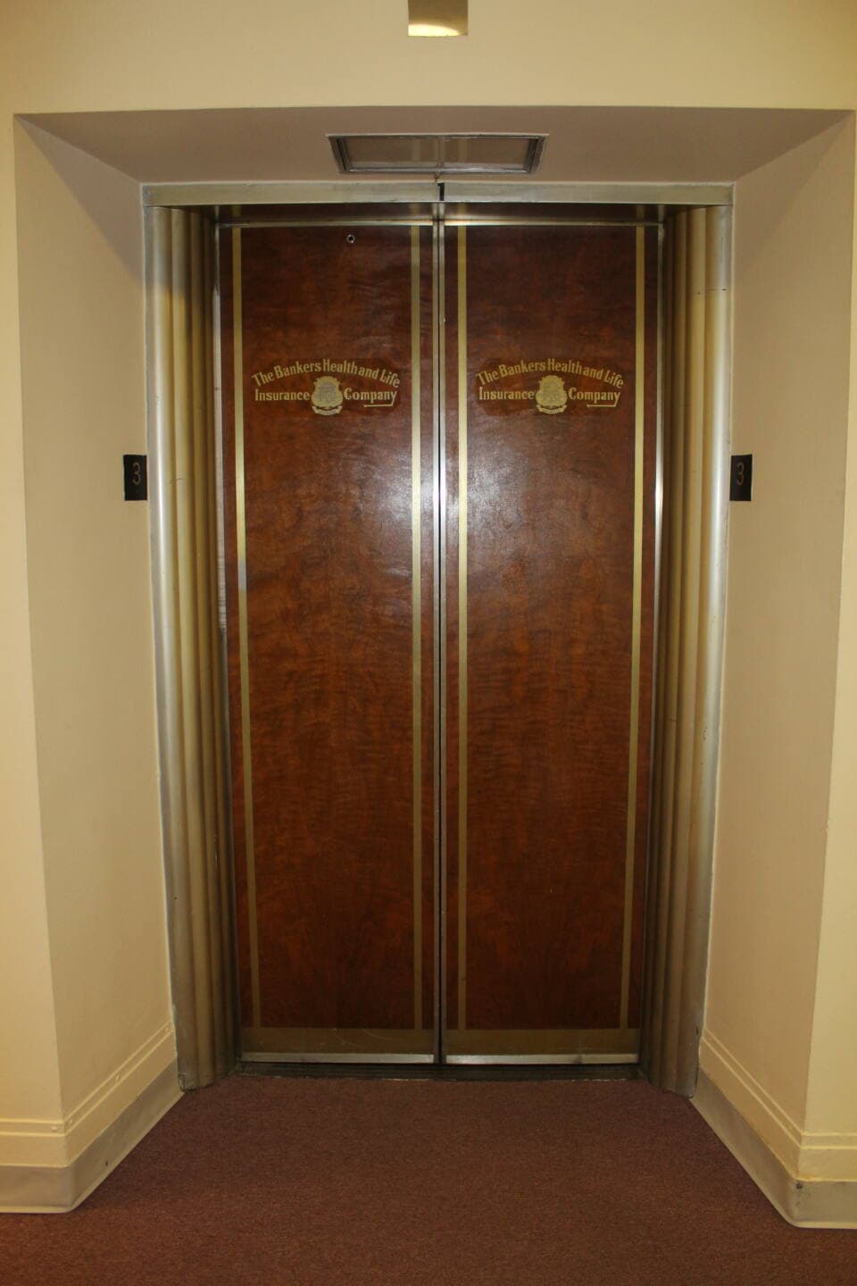 Historic elevator door The Trust