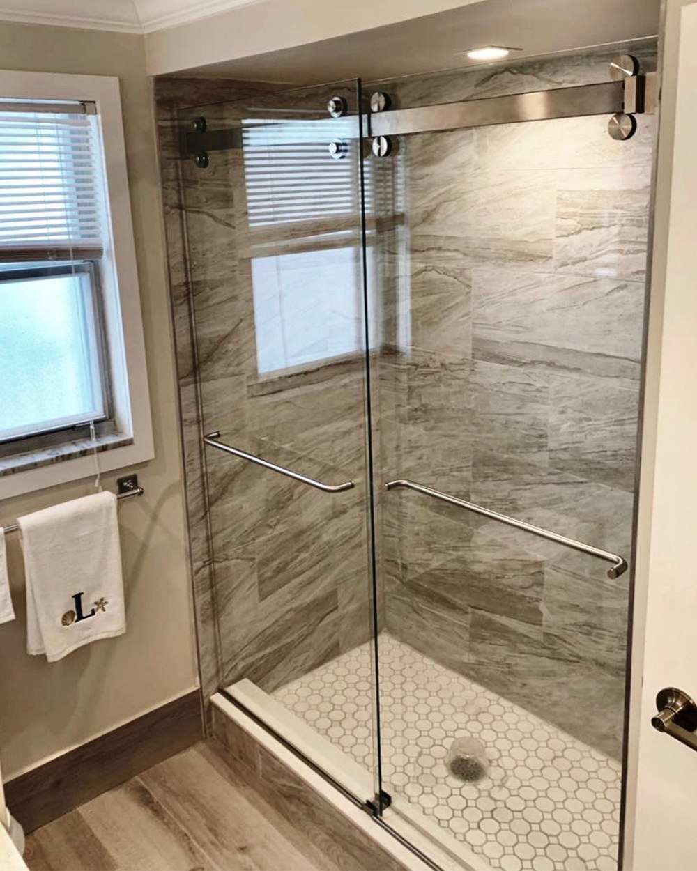 The Original Frameless Shower Doors The Original Frameless Shower Doors Introduces Swinging Shower Doors