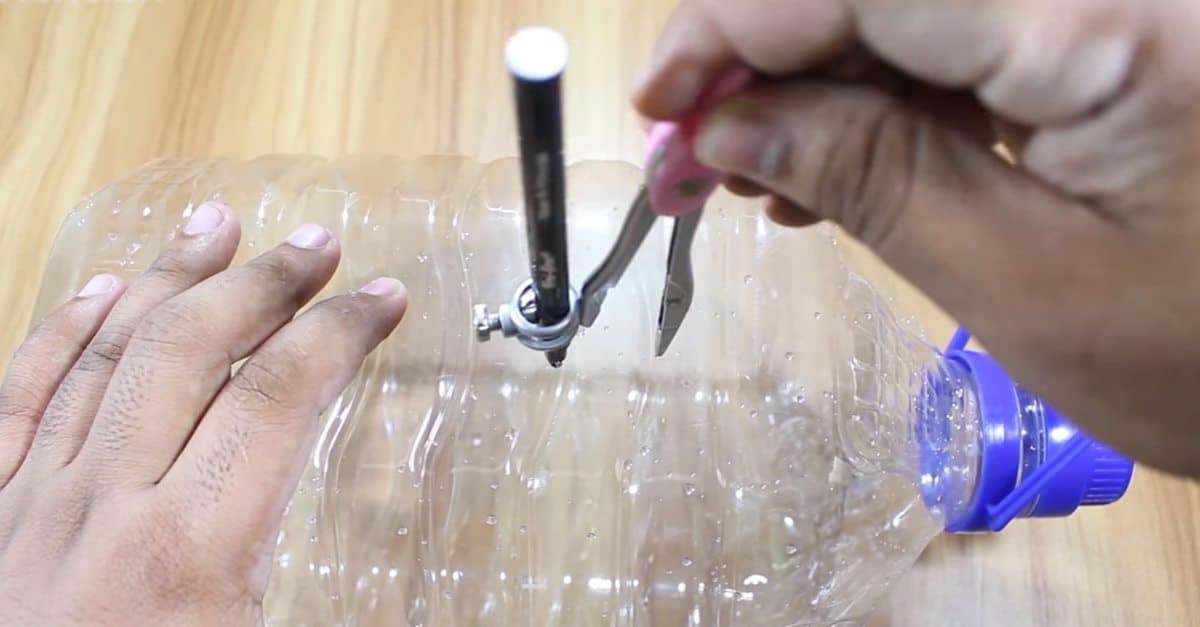 Fisherman drills holes in a water bottle for a bait trick anyone can try GetZone