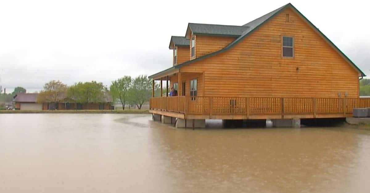 Fisherman builds dream house on pond complete with living room 'fishing hole'
