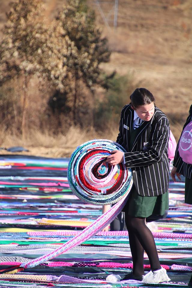 67 Blankets just broke another world record, this time using scarves.