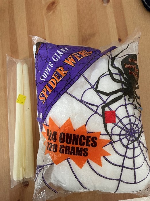 How To DIY Spooky Ghost Candles with Thrifted Home Goods from Goodwill