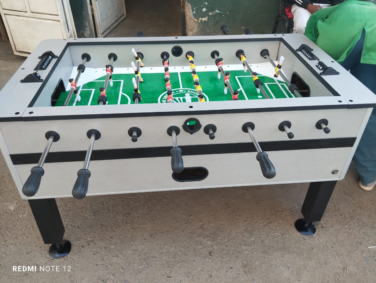 Domestic foosball table in kenya operates without a token machine