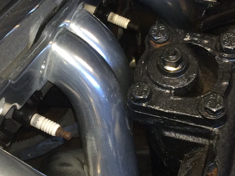 Straight vs angle plug SBC heads Grumpys Performance Garage