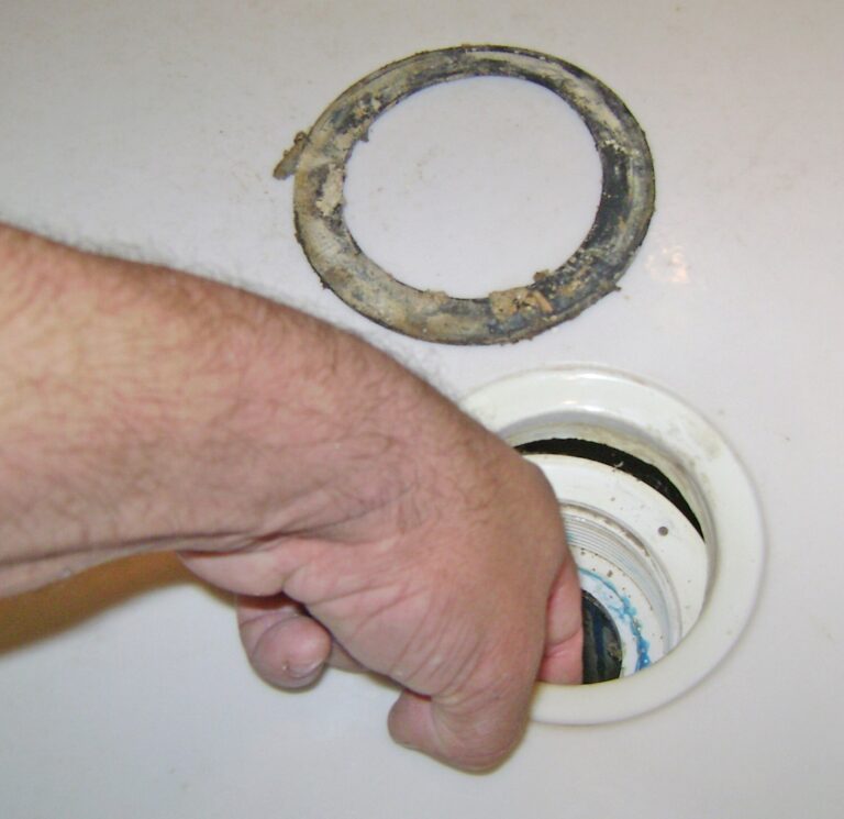 How to Fix a Leaky Shower Drain Diassemble the Drain HandyManHowTo