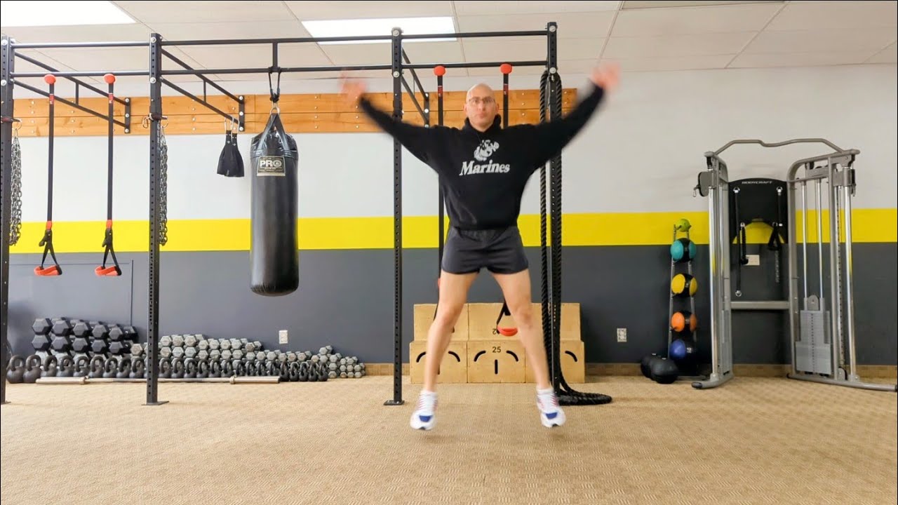 How to do ﻿Side Straddle Hops aka Jumping Jacks Exercise