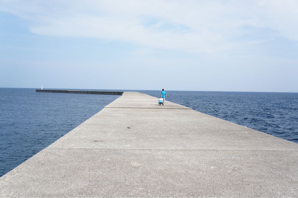 能登の宇出津港に釣り好きな友人と来ています Exception Code.