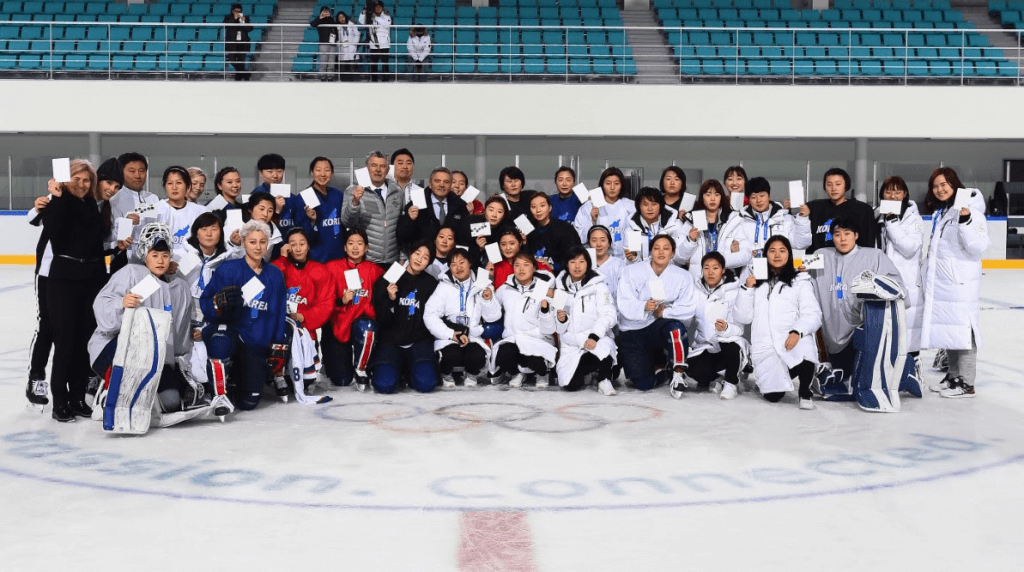 Korean Women’s Ice Hockey Teams Unified for a Historical WhiteCard Photo