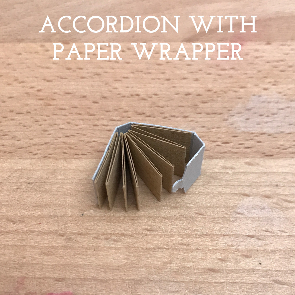 // Macro to Micro Miniature Bookbinding Herringbone Bindery