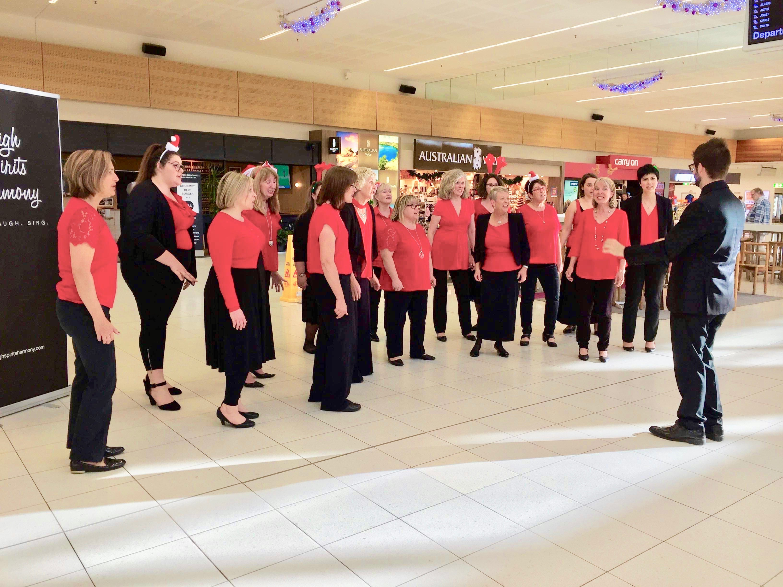 High Spirits Harmony Christmas singing at the airport 22/12/18 Photos