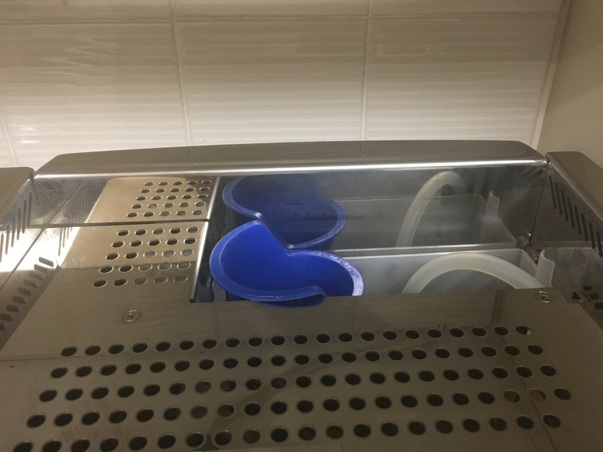 How do you fill the water tank of your espresso machine?