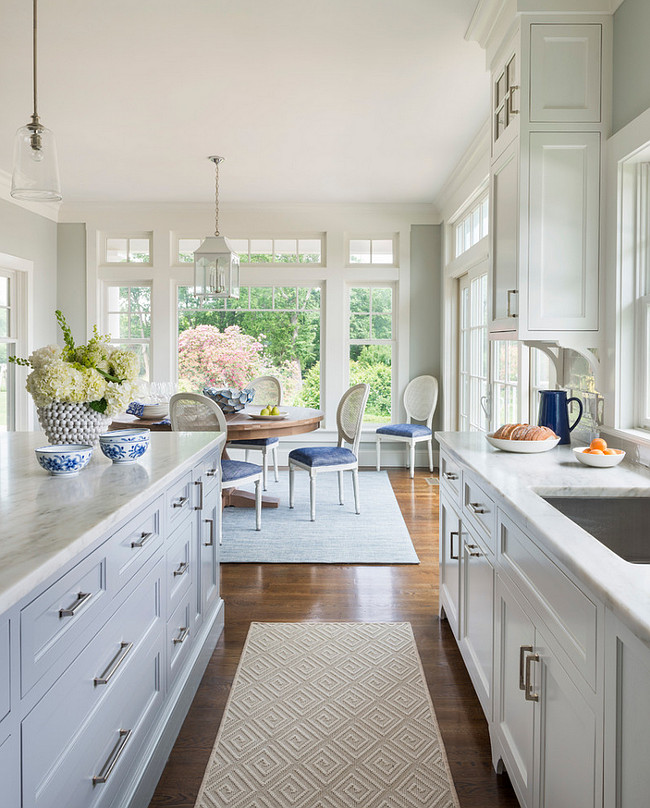 White and gray kitchen with navy blue accents. White and gray kitchen