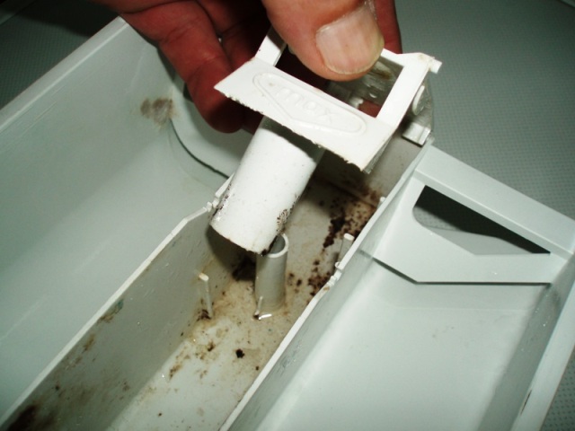 How to Repair How to clean and service a washing machine soap drawer