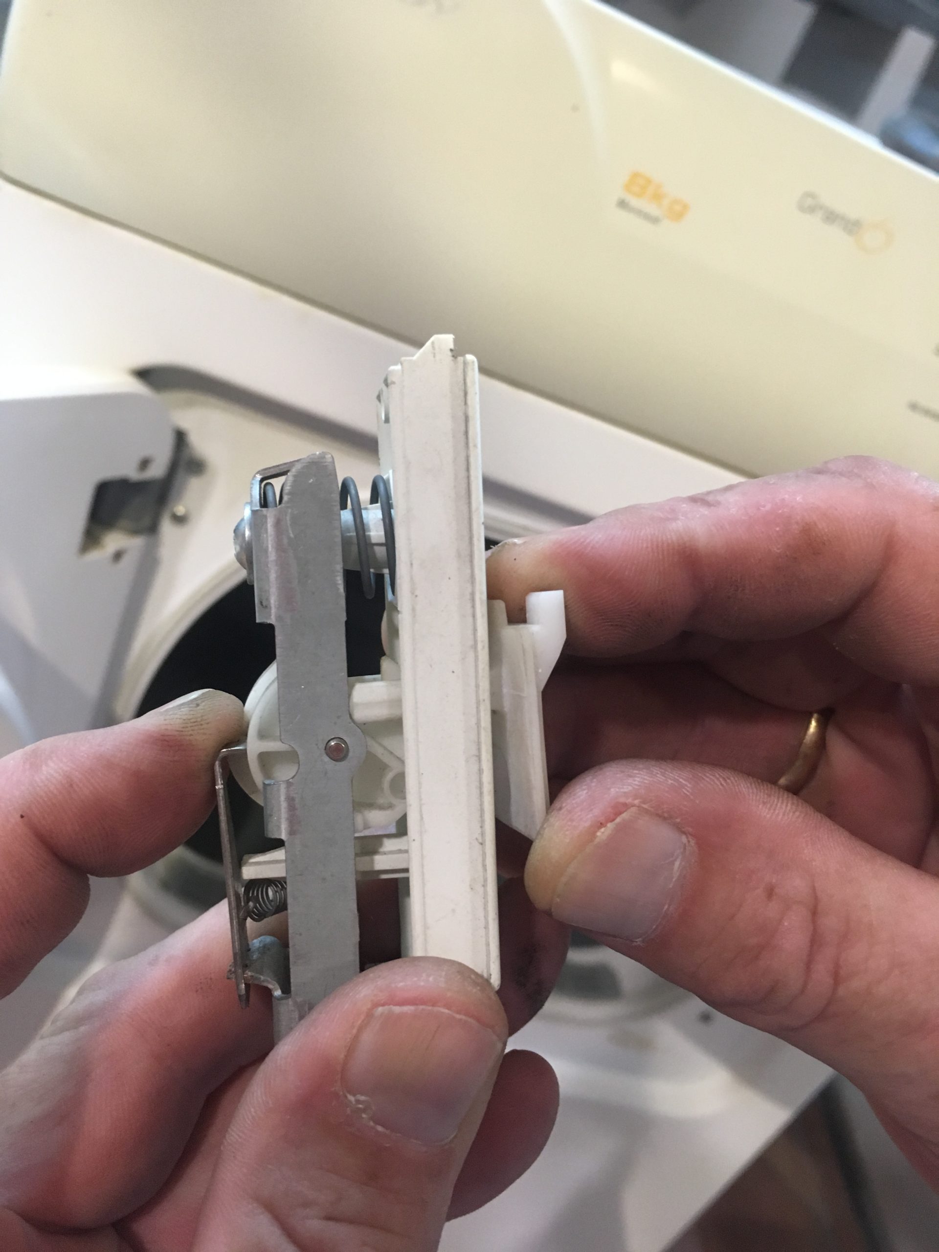 How to Repair tumble dryer door lock mechanism