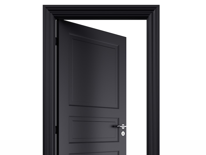 What is the average life expectancy of an interior solid core wood door?