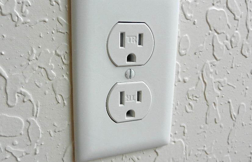 What is reversed polarity at an outlet/receptacle? Why is it dangerous?