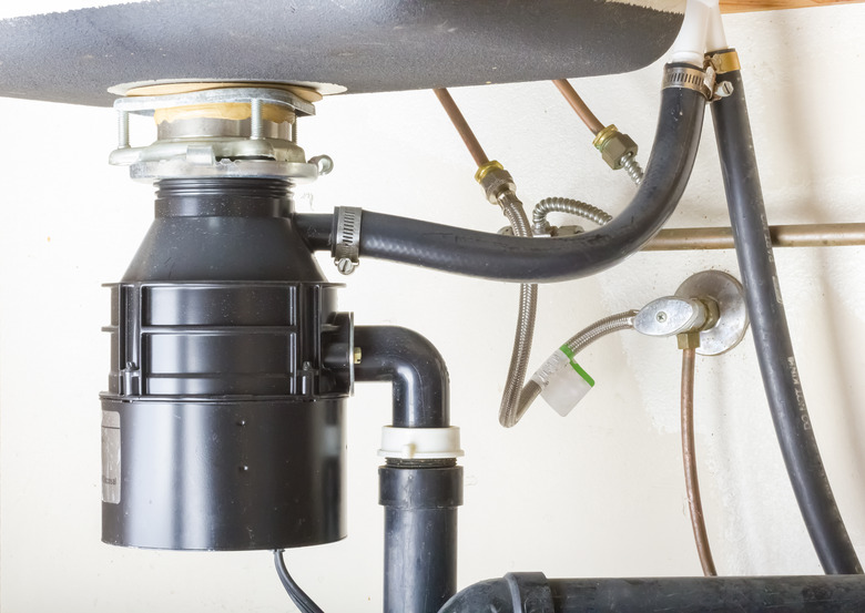How to Use Plumbers Putty for Garbage Disposal Repair Hunker