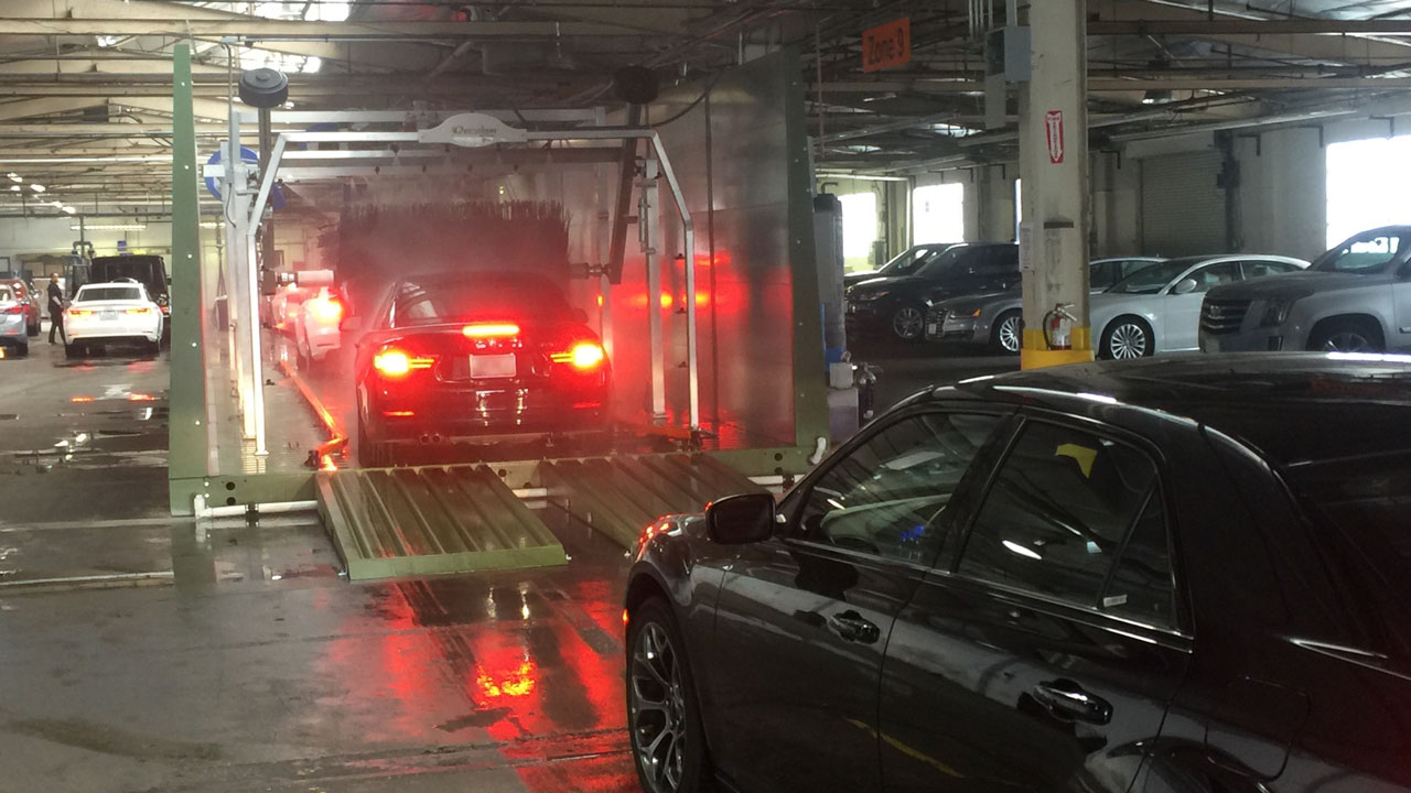 Automatic DriveThrough Car Wash on Steel Wash Pads